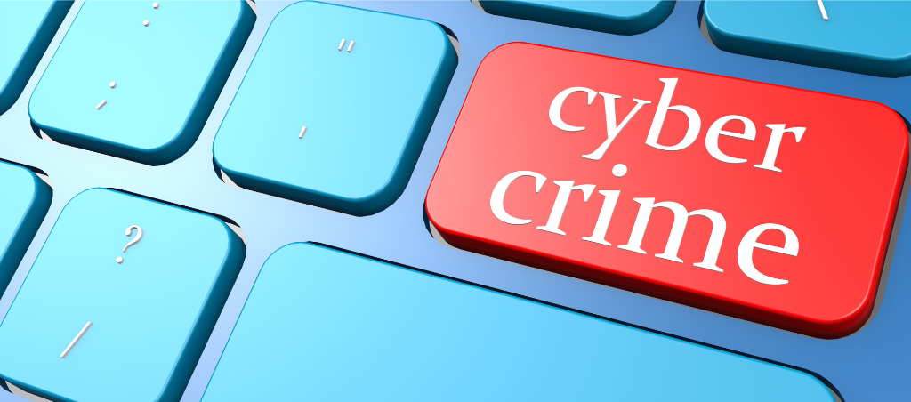 Cyber Crime written on Keyboard